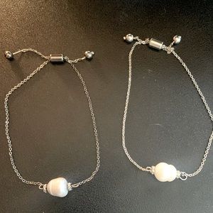 2 natural pearl bracelets. 1 antique silver/ grayish pearl& 1 silver/white pearl